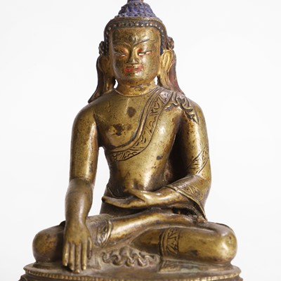 Lot 148 - A Tibetan bronze Shakyamuni Buddha
