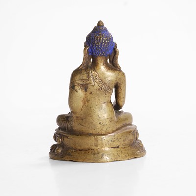Lot 148 - A Tibetan bronze Shakyamuni Buddha
