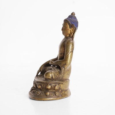 Lot 148 - A Tibetan bronze Shakyamuni Buddha