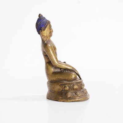 Lot 148 - A Tibetan bronze Shakyamuni Buddha