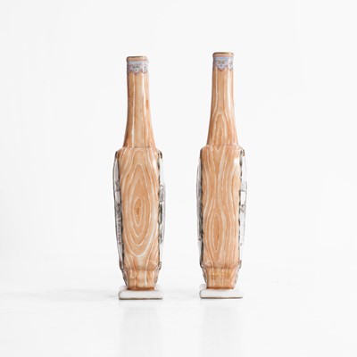 Lot 140 - A pair of Chinese faux bois-enamelled porcelain vases