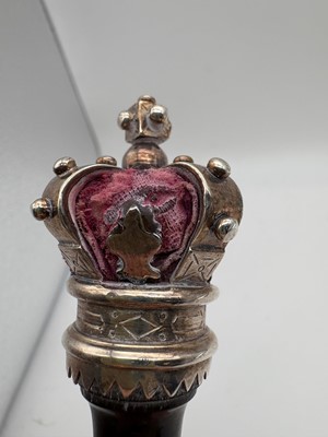 Lot 13 - A Victorian ebony and silver mounted tipstaff