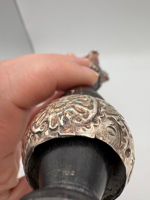 Lot 13 - A Victorian ebony and silver mounted tipstaff