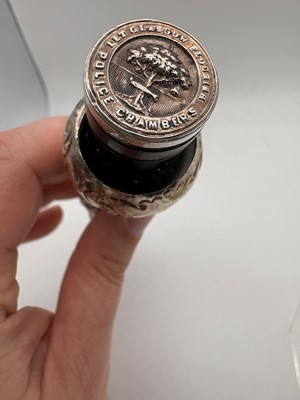 Lot 13 - A Victorian ebony and silver mounted tipstaff