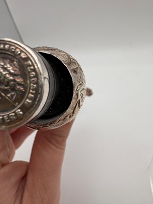 Lot 13 - A Victorian ebony and silver mounted tipstaff