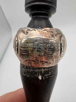 Lot 13 - A Victorian ebony and silver mounted tipstaff