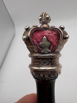 Lot 13 - A Victorian ebony and silver mounted tipstaff