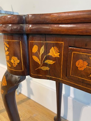 Lot 345 - A mahogany and marquetry card table