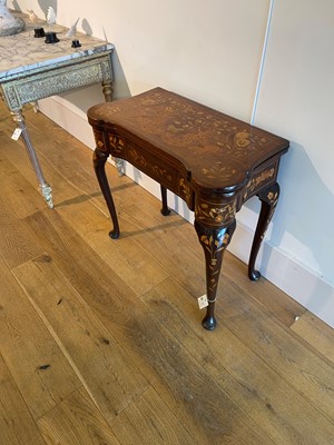 Lot 345 - A mahogany and marquetry card table