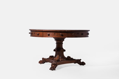 Lot 529 - A William IV golden oak drum library table by Gillows