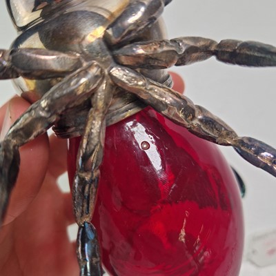 Lot 108 - A silver-plated and glass preserve pot