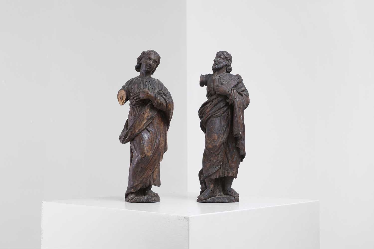 Lot 311 - A pair of baroque carved limewood figures