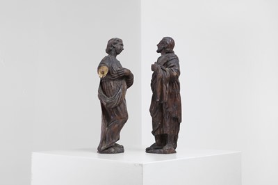 Lot 311 - A pair of baroque carved limewood figures