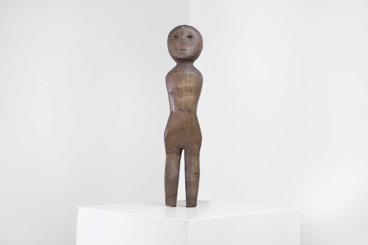 Lot 314 - A carved oak doll