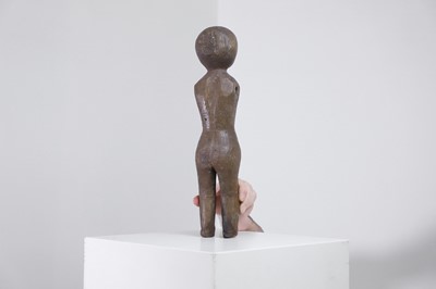 Lot 314 - A carved oak doll