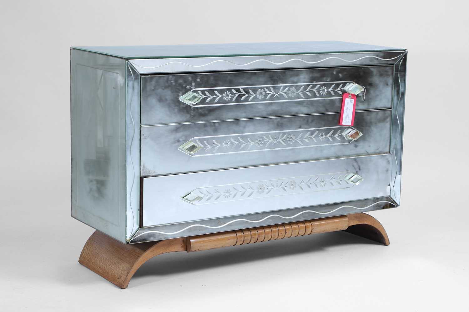Lot 501 - An Art Deco style mirrored chest of drawers