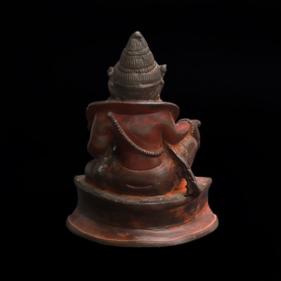 Lot 61 - A Tibetan painted bronze figure of Kubera
