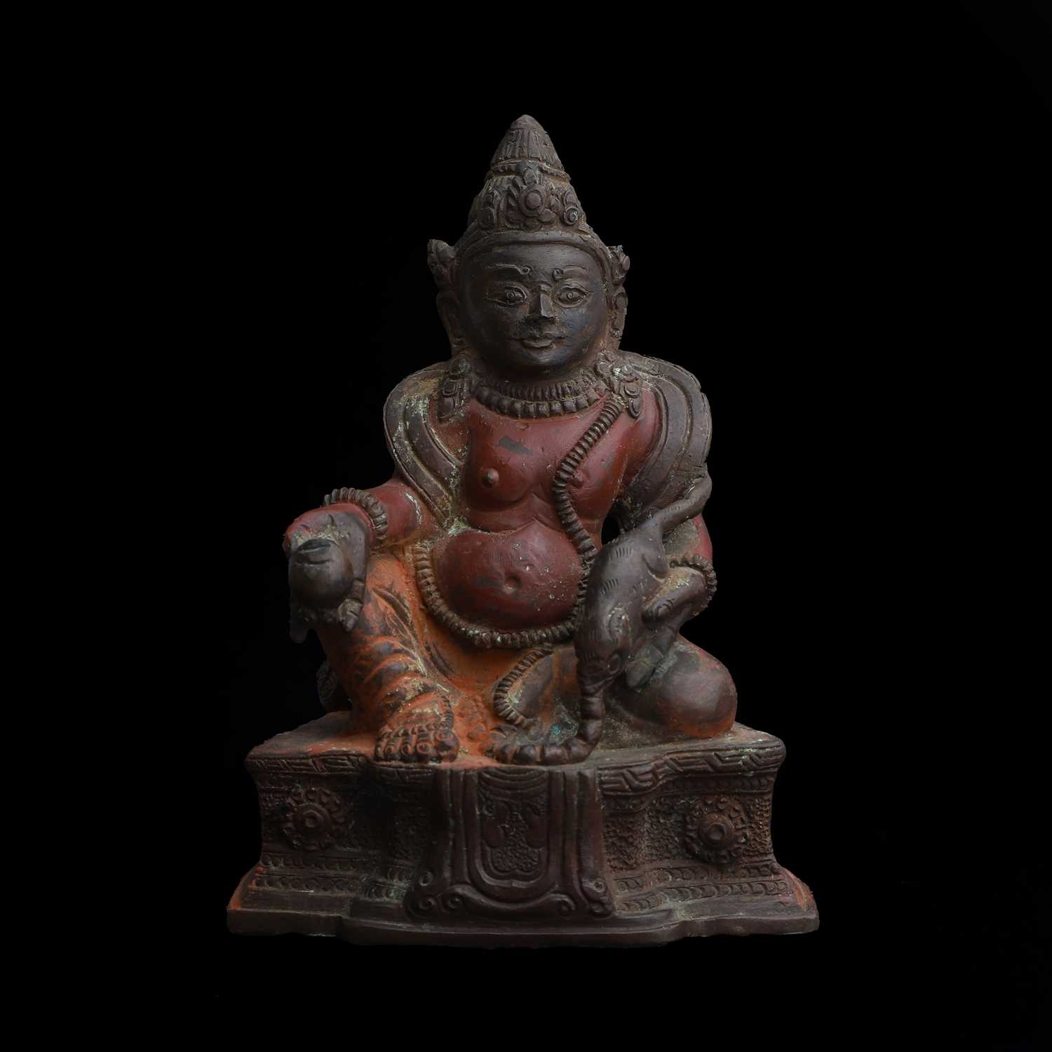 Lot 61 - A Tibetan painted bronze figure of Kubera