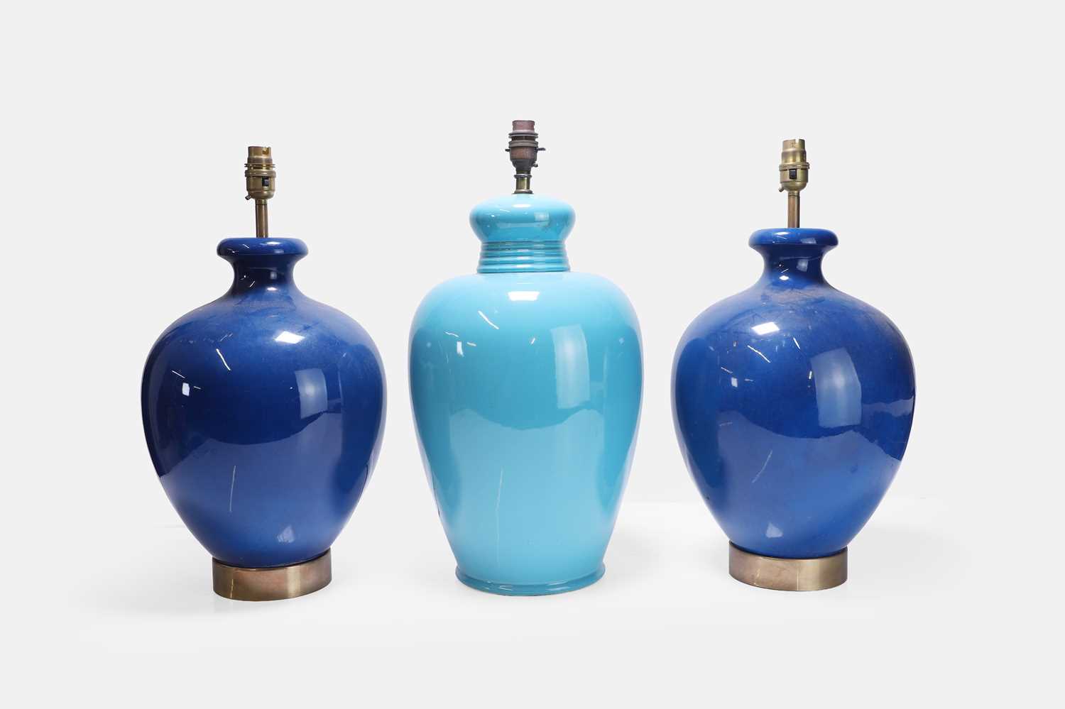 Lot 329 - A group of three blue table lamps