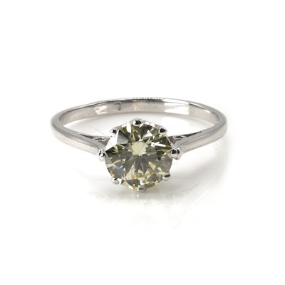 Lot 197 - † A fancy yellow diamond single stone ring