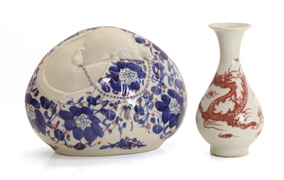 Lot 54 - A Chinese porcelain Buddha