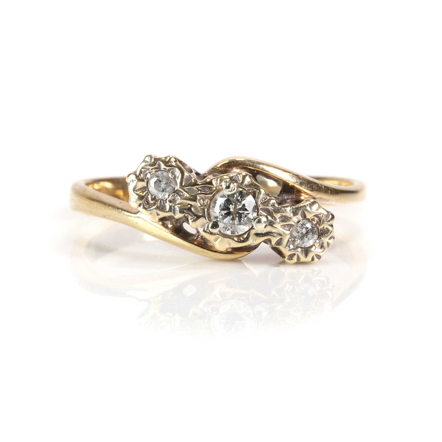 Lot 51 - A 9ct gold diamond three stone crossover ring