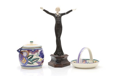 Lot 310 - An Art Nouveau bronze and ivorine figurine