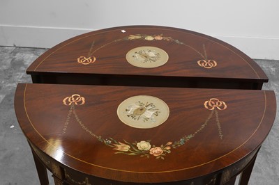 Lot 505 - A pair of mahogany painted console tables