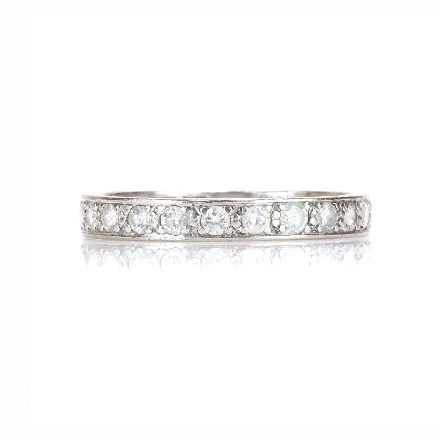 Lot 62 - A diamond full eternity ring