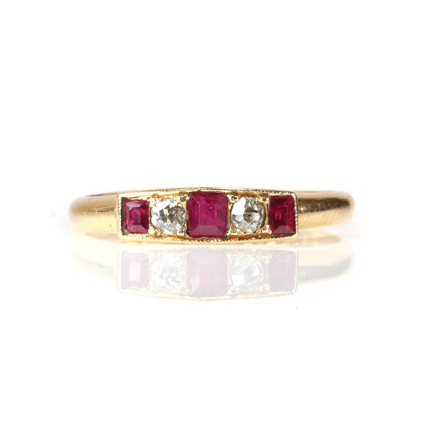Lot 8 - An Edwardian 18ct gold ruby and diamond five stone ring