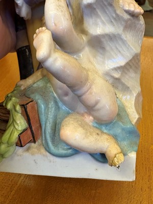 Lot 106 - A KPM Berlin porcelain monkey group