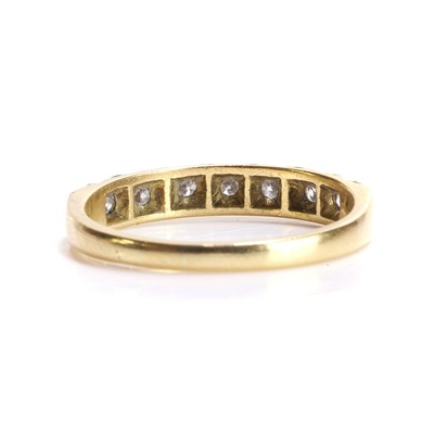 Lot 78 - An 18ct gold diamond half eternity ring