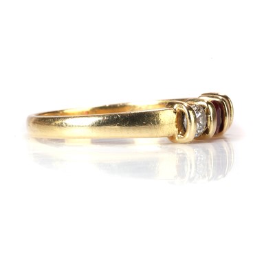 Lot 76 - An 18ct gold ruby and diamond ring