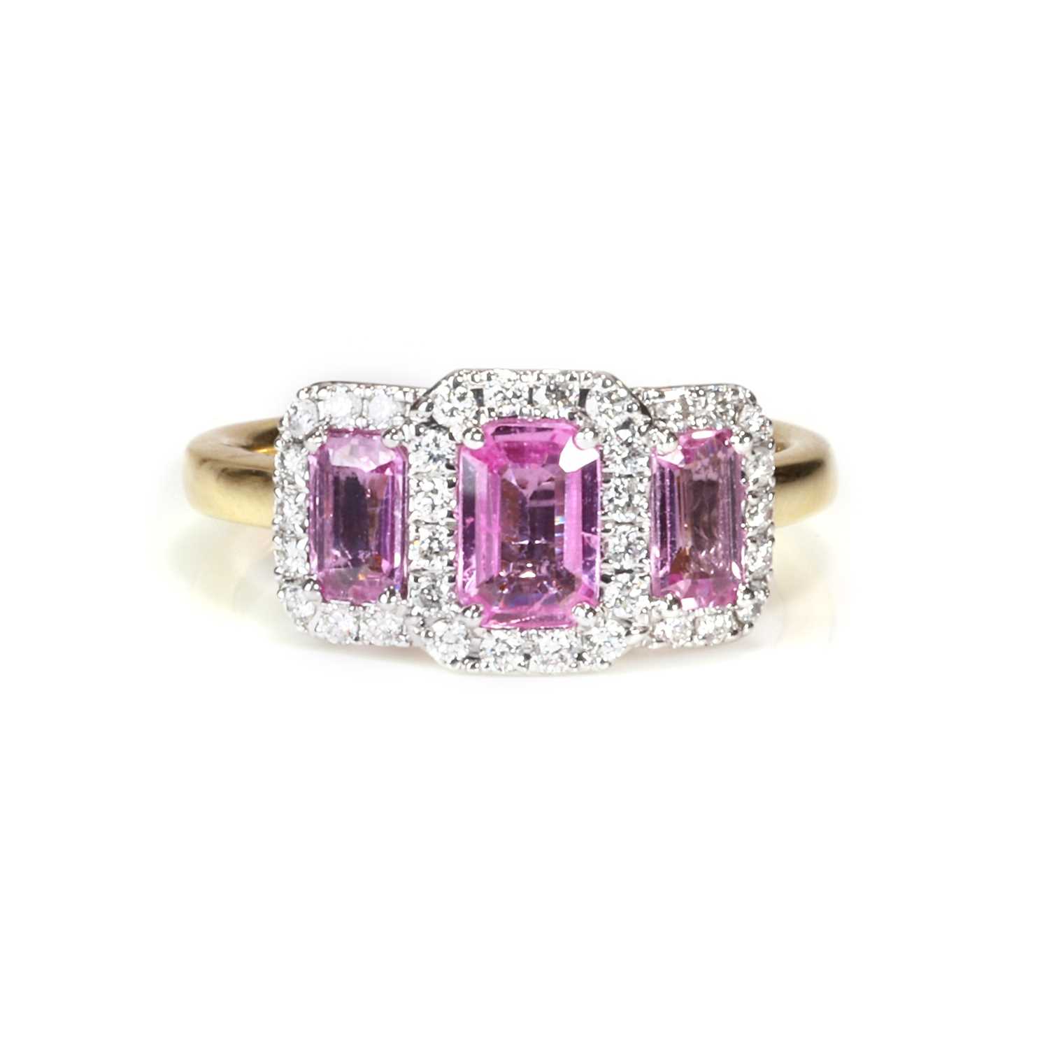 Lot 101 - An 18ct gold pink sapphire and diamond triple cluster ring