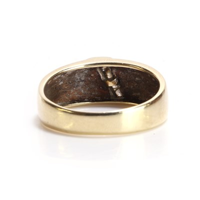 Lot 41 - A 9ct gold diamond set band ring