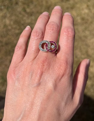 Lot 30 - A ruby and diamond interlocking circle ring