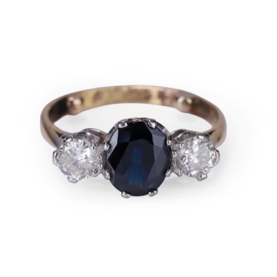 Lot 54 - A sapphire and diamond three stone ring