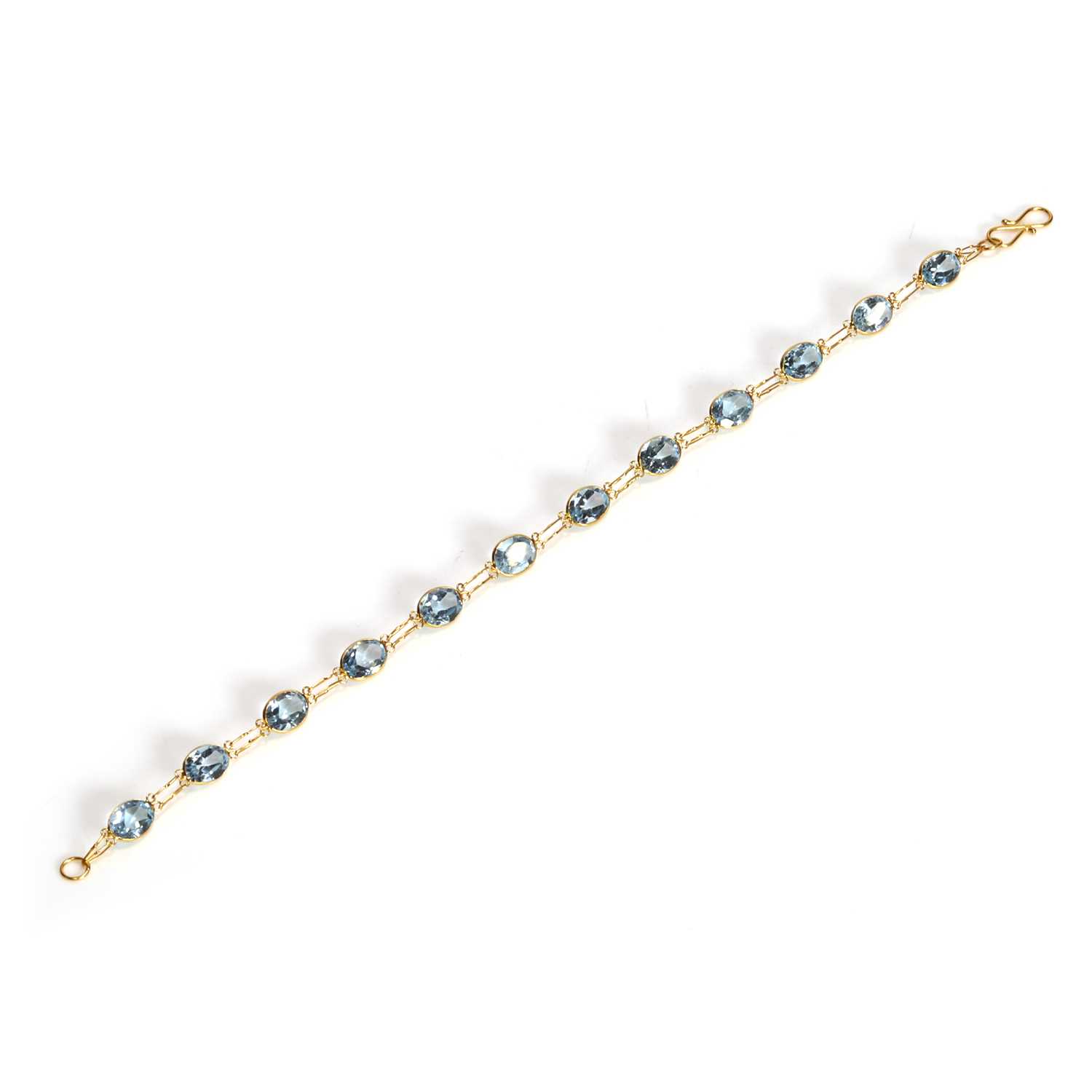 Lot 89 - A blue topaz line bracelet