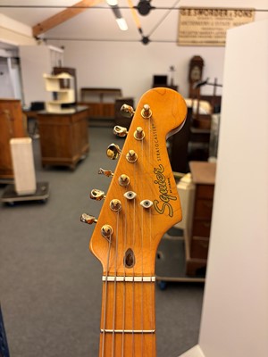 Lot 351 - A Fender Squier Stratocaster guitar