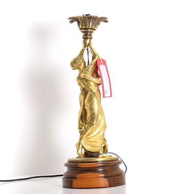 Lot 472 - A gilt bronze figural torchiere