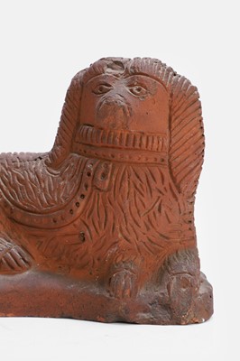 Lot 93 - A Staffordshire-style terracotta figure of a spaniel