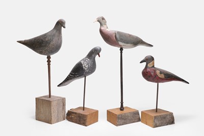 Lot 119 - A flight of four wooden decoy pigeons