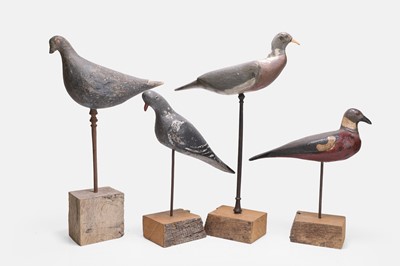 Lot 119 - A flight of four wooden decoy pigeons