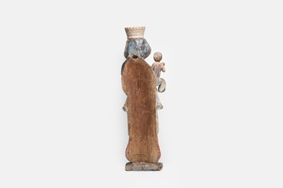 Lot A carved wooden figure group of the Madonna and Child