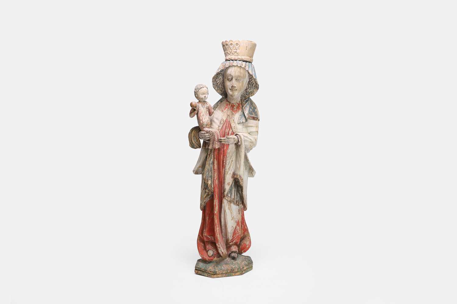Lot A carved wooden figure group of the Madonna and Child