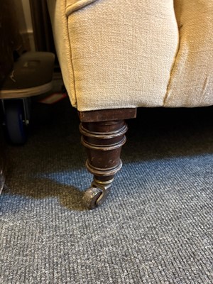 Lot 507 - A small Victorian drop-arm sofa