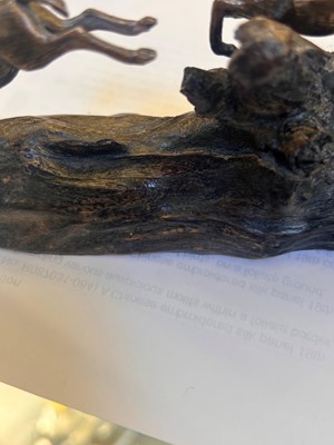Lot 12 - A silver and wood model of leaping impalas