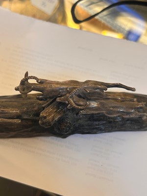 Lot 12 - A silver and wood model of leaping impalas