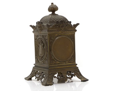Lot 203 - A cast metal mantle clock