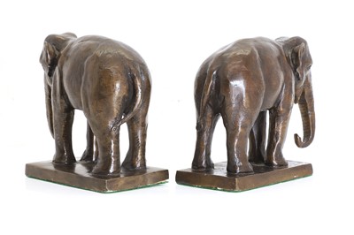 Lot 252 - A pair of bronze bookends